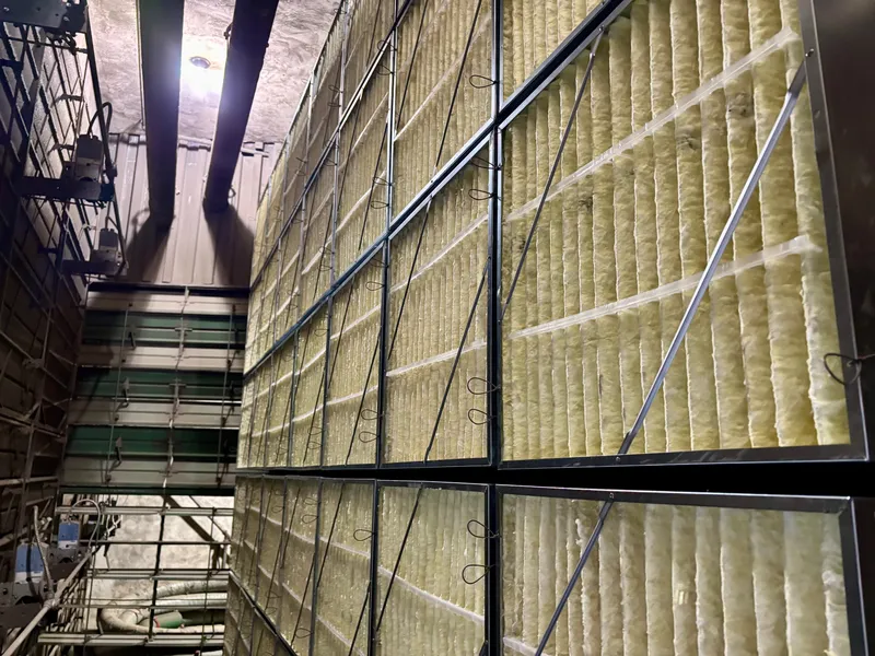 Wall of fiberglass filters in an industrial plant air handler